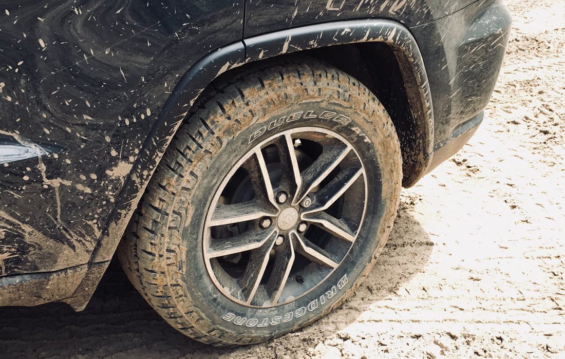 Bridgestone Dueler A/T REVO 3 in dirt off-road